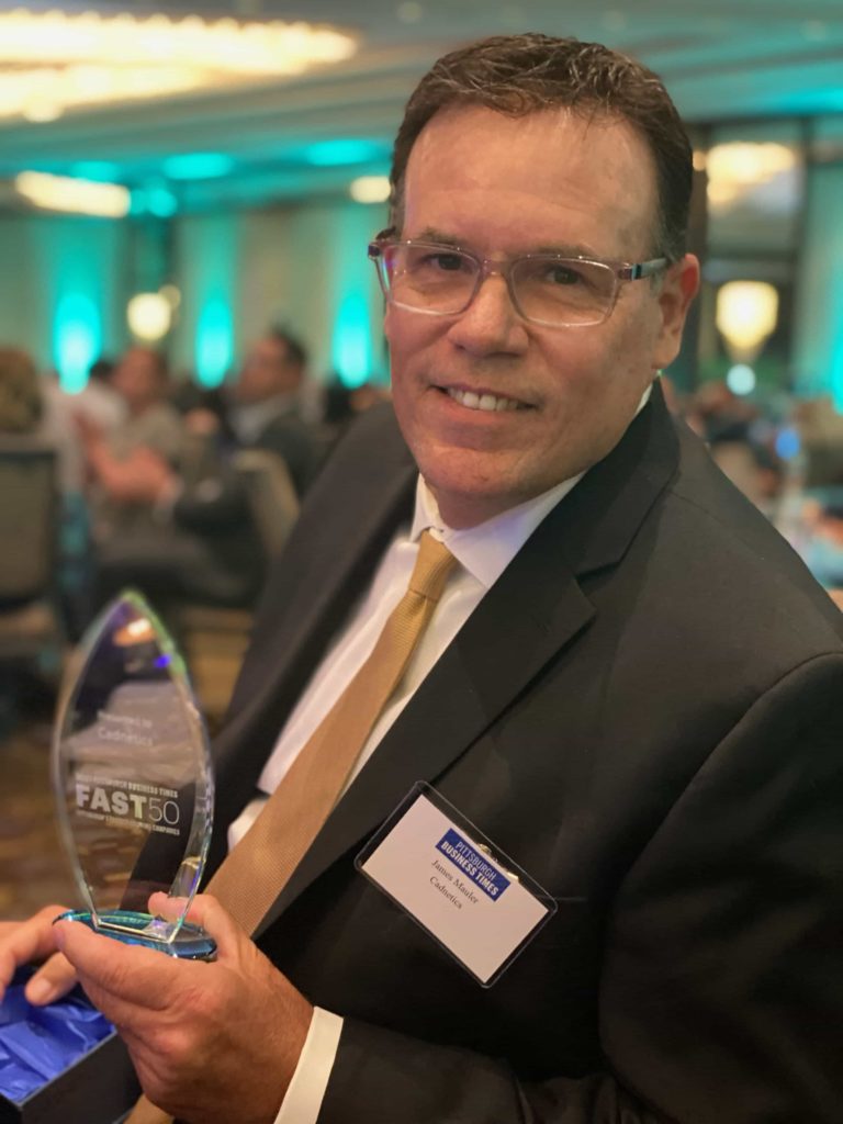 James Mauler, President and CEO of Cadnetics accepts the 2021 Pittsburgh Fast 50 award